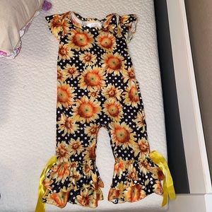 Sunflower romper with flare bottom